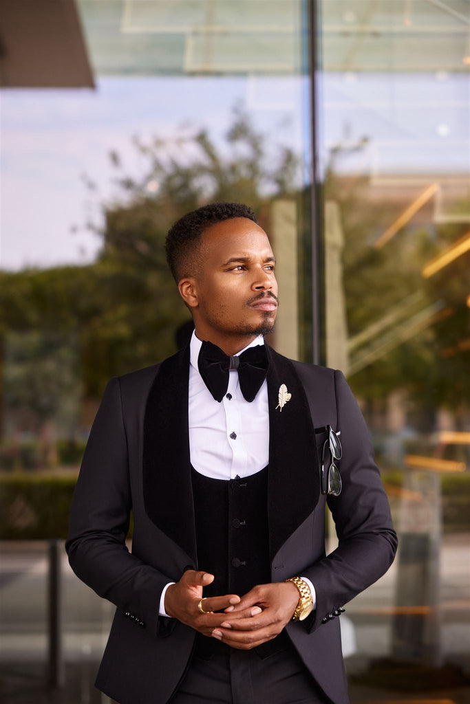 Black Three-piece velvet tuxedo with a luxurious jacket, modern slim trousers, and sleek vest. Perfect for formal events, weddings, and special occasions