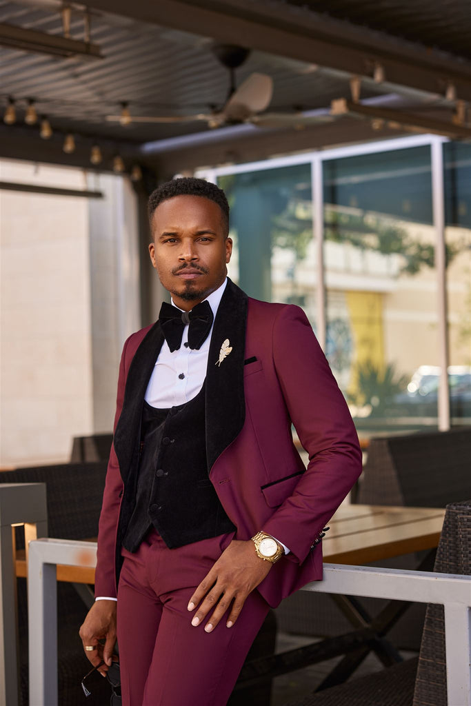 Burgundy Three-piece velvet tuxedo with a luxurious jacket, modern slim trousers, and sleek vest. Perfect for formal events, weddings, and special occasions