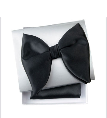 Black oversized butterfly bowtie made from satin, perfect for formal occasions